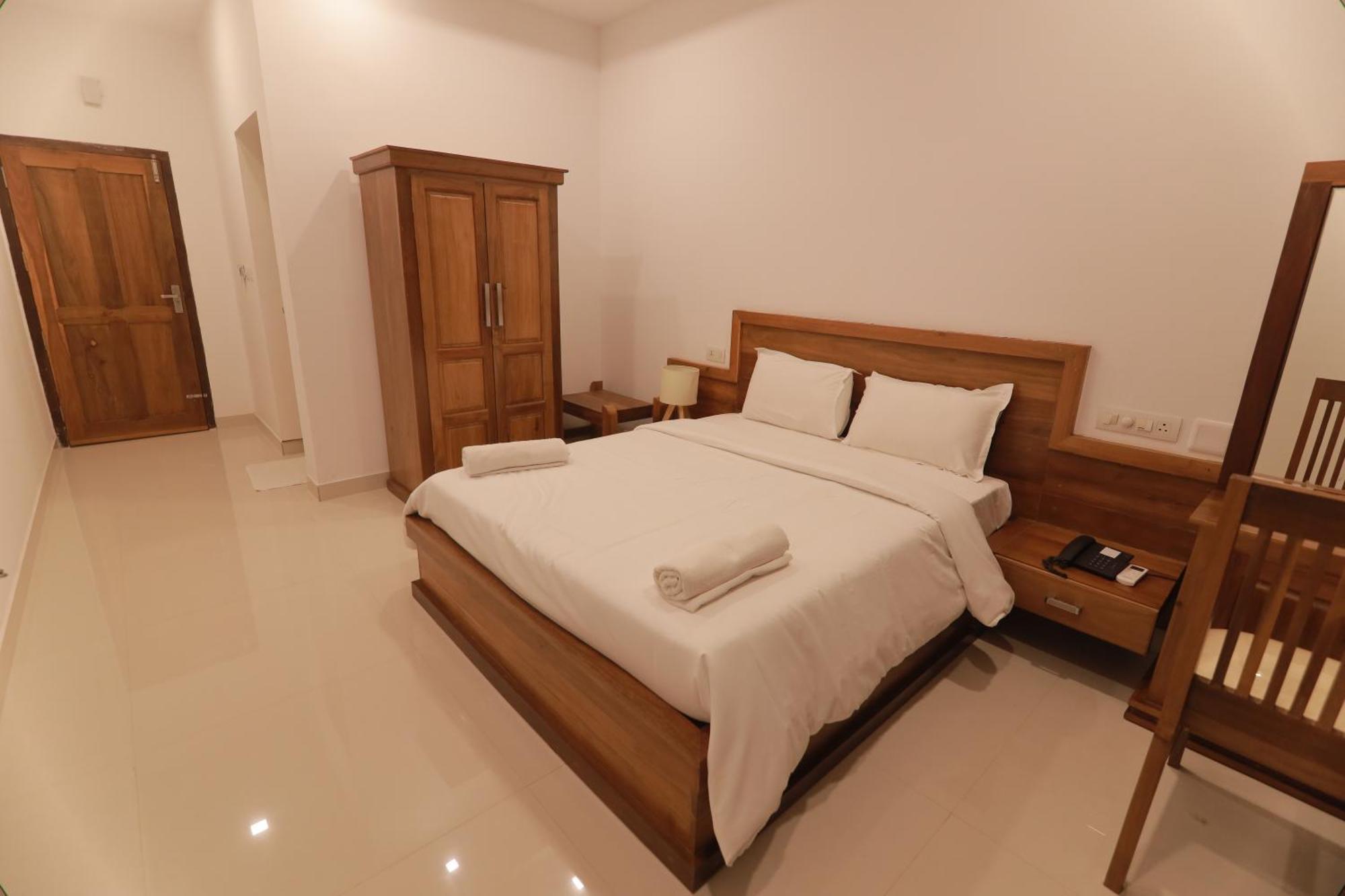 Opm Inn Payyannur Екстериор снимка